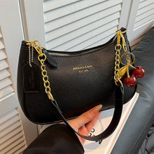 Cargar imagen en el visor de la galería, Bolso bandolera versátil de un solo hombro con cadena y forma de dumpling.
